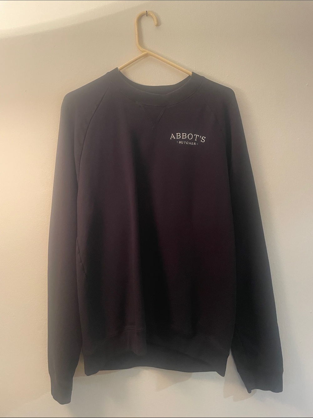 Brooklinen Black Crewneck Sweatshirt with White Chest Logo